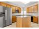 Updated kitchen features stainless steel appliances, custom cabinets, and a kitchen island at 16291 Raven Crest Dr, Indian Land, SC 29707