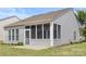 Screened-in porch offering an outdoor living space with views of the backyard and neighborhood at 16291 Raven Crest Dr, Indian Land, SC 29707