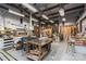 Workshop features ample lighting and industrial equipment at 16291 Raven Crest Dr, Indian Land, SC 29707