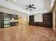 This basement features recessed lighting, stainless steel appliances, and built-in shelving at 16319 Ashlyn Chase Ct, Charlotte, NC 28277
