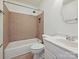 Bathroom featuring a tiled shower-tub with a vanity and ample lighting at 16319 Ashlyn Chase Ct, Charlotte, NC 28277