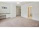 Bedroom featuring built in desk and cabinetry with an ensuite bathroom at 16319 Ashlyn Chase Ct, Charlotte, NC 28277