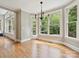 Bright dining area featuring hardwood floors and plenty of natural light at 16319 Ashlyn Chase Ct, Charlotte, NC 28277