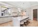 A spacious kitchen with a large marble island and modern stainless steel appliances at 1719 Shoreham Dr, Charlotte, NC 28211