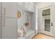 Functional mudroom with built-in storage, seating, and direct access to the exterior at 1719 Shoreham Dr, Charlotte, NC 28211