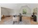 Bright office featuring vaulted ceilings, stylish furniture, and ample workspace at 1719 Shoreham Dr, Charlotte, NC 28211