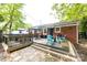Multi-level deck offers outdoor entertaining, relaxation, and room for grilling at 1816 Anderson St, Charlotte, NC 28205