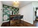 Stylish bar area with custom wallpaper and lighting, perfect for entertaining at 1816 Anderson St, Charlotte, NC 28205