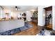 Open concept living room with hardwood floors, modern décor, and seamless flow to dining area at 1816 Anderson St, Charlotte, NC 28205
