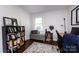 Functional home office provides a comfortable workspace with built-in shelves and natural light, perfect for productivity at 1816 Anderson St, Charlotte, NC 28205