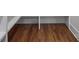 Unfinished basement featuring hardwood floors and built in shelving at 1816 Parson St, Charlotte, NC 28205