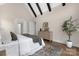 Bedroom featuring vaulted ceiling, hardwood floors and a neutral color palette at 1816 Parson St, Charlotte, NC 28205