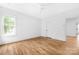 Bright bedroom with hardwood floors, white walls and bright, natural light at 1816 Parson St, Charlotte, NC 28205