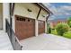 Two car garage, with matching trim and wooden doors at 1816 Parson St, Charlotte, NC 28205