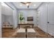Comfortable home office with desk, natural light, and built-in shelving and neutral decor at 1816 Parson St, Charlotte, NC 28205