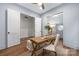 Versatile office space featuring a desk, storage, and a charming round window with natural light at 1816 Parson St, Charlotte, NC 28205