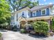 Charming two-story home with a welcoming front porch and beautifully landscaped yard in a desirable neighborhood at 1900 Nassau Blvd, Charlotte, NC 28205