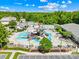 Picturesque aerial view of the community pool complex, showcasing multiple pools, slides, and seating areas at 2007 Lydney Cir, Waxhaw, NC 28173