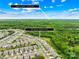 Neighborhood aerial view, close to Downtown Waxhaw, showing proximity to amenities and natural surroundings at 2007 Lydney Cir, Waxhaw, NC 28173