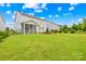 Large, well-maintained backyard featuring a screened porch and lush lawn, perfect for outdoor enjoyment and relaxation at 2007 Lydney Cir, Waxhaw, NC 28173