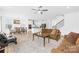 Living area featuring an open floor plan that connects the living room to dining and kitchen at 2007 Lydney Cir, Waxhaw, NC 28173
