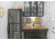 Stylish bar area features a wine fridge, glass storage, and elegant countertop at 2106 Yellowstone Dr, Fort Mill, SC 29707