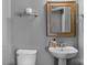 This bathroom features a toilet, sink, mirror, and nice decor at 2106 Yellowstone Dr, Fort Mill, SC 29707