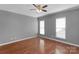 This bedroom features hardwood floors, neutral walls, and two windows at 2106 Yellowstone Dr, Fort Mill, SC 29707