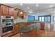 Beautiful kitchen with stainless steel appliances, granite countertops, and custom wood cabinetry at 2106 Yellowstone Dr, Fort Mill, SC 29707