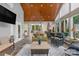 Cozy sunroom with stone flooring, comfortable seating, and serene outdoor views at 2106 Yellowstone Dr, Fort Mill, SC 29707