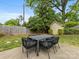 Outdoor dining area with modern table and chairs, ideal for enjoying meals in the backyard at 2110 Winter St, Charlotte, NC 28205