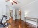 Bedroom with hardwood floors leading to a full bathroom and an additional bedroom at 2110 Winter St, Charlotte, NC 28205