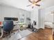 Bedroom with desk, exercise bike and hardwood floors at 2110 Winter St, Charlotte, NC 28205