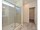 Bathroom featuring glass enclosed shower with tile surround and a walk-in closet at 2206 Catawba Trace Dr, Catawba, NC 28609