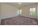 Spacious bedroom with carpet flooring and large windows with natural light at 2206 Catawba Trace Dr, Catawba, NC 28609