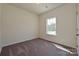 Bedroom with carpet flooring, natural light and a view of the outdoors at 2206 Catawba Trace Dr, Catawba, NC 28609