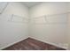 Spacious carpeted walk-in closet with multiple wire shelves for ample storage at 2206 Catawba Trace Dr, Catawba, NC 28609
