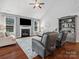 Inviting living room features hardwood floors, a cozy fireplace, and stylish furnishings for comfortable living at 2467 Chatham Dr, Fort Mill, SC 29707