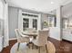 Dining area featuring hardwood floors and access to outdoor space through french doors at 2467 Chatham Dr, Indian Land, SC 29707