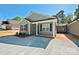 Charming single-story home with light green siding, black shutters, and a concrete driveway at 2502-2504 Glendale Ave, Kannapolis, NC 28081