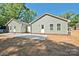 Charming single-story home with light green siding, white trim, and a concrete patio area at 2502-2504 Glendale Ave, Kannapolis, NC 28081