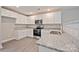 Well-equipped kitchen featuring stainless steel appliances and granite countertops at 2502-2504 Glendale Ave, Kannapolis, NC 28081