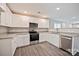 Well-equipped kitchen featuring stainless steel appliances and granite countertops at 2502-2504 Glendale Ave, Kannapolis, NC 28081
