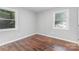 Bright bedroom features hardwood floors and a sun-filled window at 2603 Mary Ave, Gastonia, NC 28052