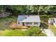 Charming bungalow with a large wooden deck and well-maintained lawn and shrubbery at 2603 Mary Ave, Gastonia, NC 28052