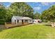 A charming house with a well-manicured lawn and a lovely wooden deck, perfect for enjoying the outdoors at 2603 Mary Ave, Gastonia, NC 28052