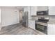 A modern kitchen with stainless steel appliances, providing a sleek and functional space for cooking and dining at 2603 Mary Ave, Gastonia, NC 28052