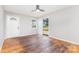 A cozy living room with a ceiling fan, wood floors, and access to a deck through sliding glass doors at 2603 Mary Ave, Gastonia, NC 28052