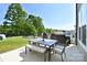 Beautiful backyard featuring a patio set, green grass, and a lovely view at 262 Country Lake Dr, Mooresville, NC 28115