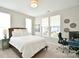 Serene bedroom featuring soft natural light, neutral tones, and a comfortable bed at 262 Country Lake Dr, Mooresville, NC 28115